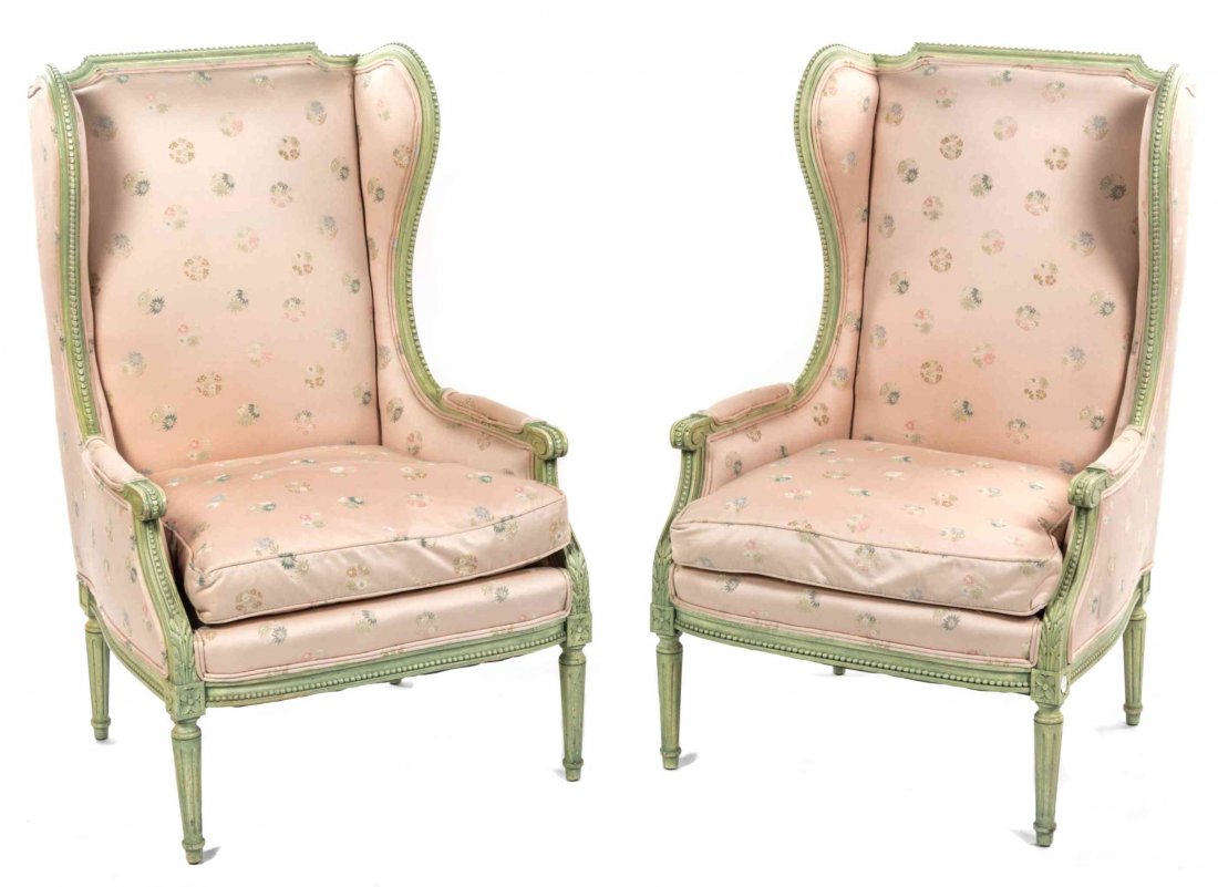 A Pair of Louis XVI Style Painted Bergeres, Height 42: A Pair of Louis XVI Style Painted Bergeres, each having an upholstered back, arms and seat, raised on fluted tapering legs. Height 42 3/4 inches. Property from the Estate of Dr. John P. & Shirley U. W