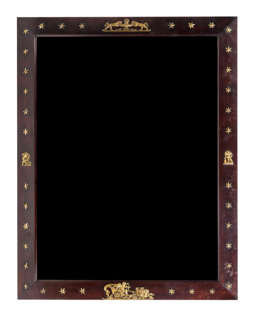 An Empire Style Gilt Bronze Mounted Mahogany Pier: An Empire Style Gilt Bronze Mounted Mahogany Pier Mirror, having a rectangular beveled plate within the conforming frame decorated with putti, animals and a chariot scene. Height 55 x width 43 1/4 inc