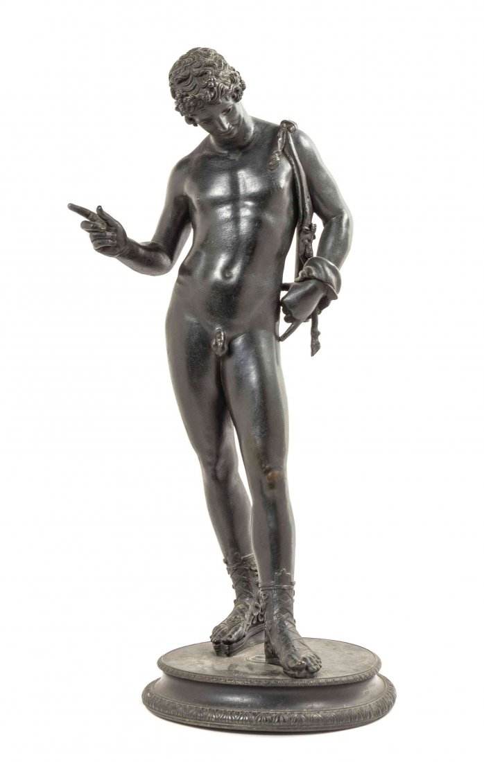 A Grand Tour Bronze Figure, AFTER THE POMPEIIAN: A Grand Tour Bronze Figure, AFTER THE POMPEIIAN ANTIQUE, depicting Narcissus standing on a circular base. Height 24 inches. Property from the Estate of Dr. Edward Spears, Chicago, Illinois