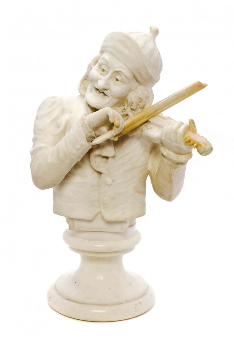 A Continental White Marble Bust, Height 19 1/2 inches.: A Continental White Marble Bust, modeled as a vagabond playing a fiddle, raised on a socle base. Height 19 1/2 inches.