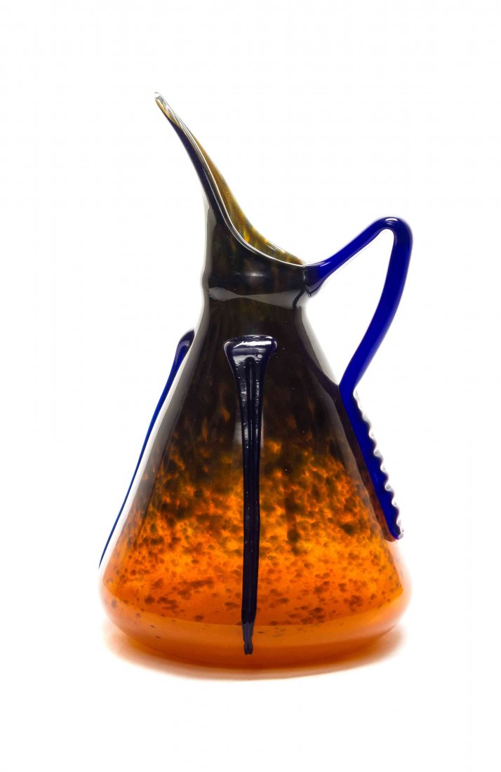 A Charles Schneider Glass Ewer, Height 13 1/4 inches.: A Charles Schneider Glass Ewer, of tapering form with applied decoration on a cobalt to orange mottled ground, etched Schneider. Height 13 1/4 inches.