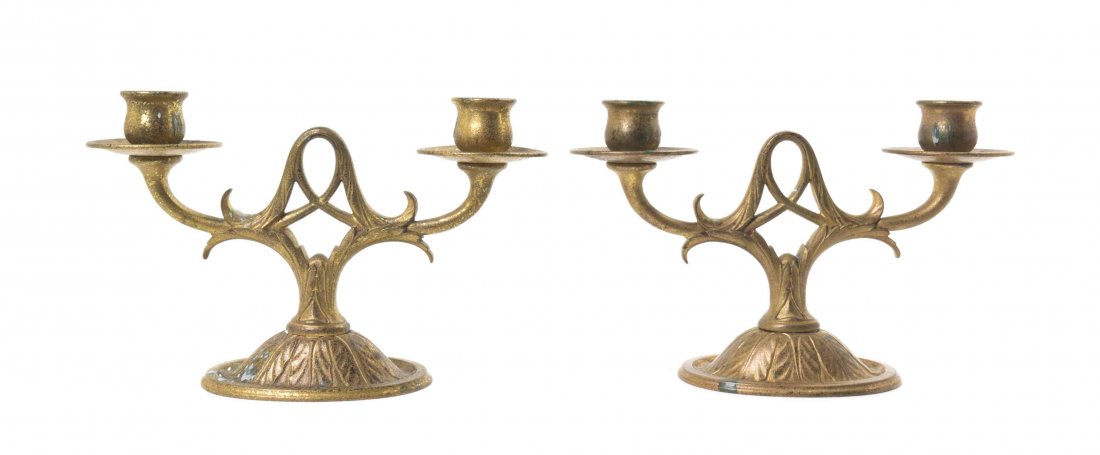 A Pair of Tiffany Studios Dore Bronze Two-Light: A Pair of Tiffany Studios Dore Bronze Two-Light Candelabra, each having a pierced foliate cast standard, issuing the tapering arms, terminating in candlecups, raised on an oval foot, stamped Tiffany S