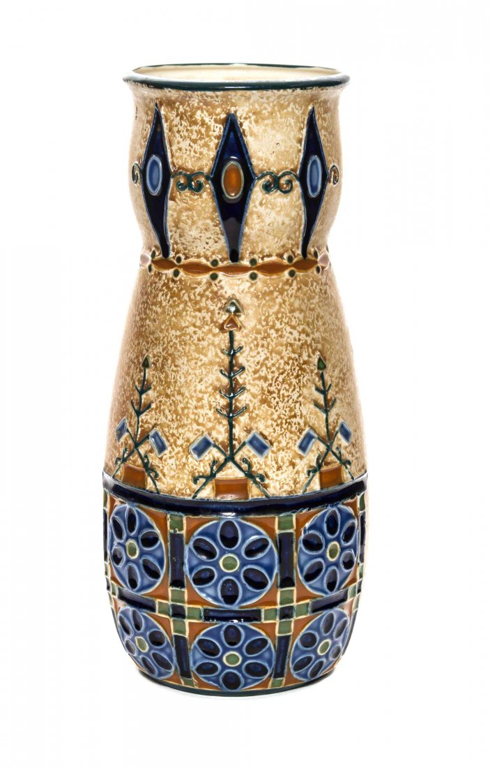 An Amphora Pottery Vase, Height 11 inches.: An Amphora Pottery Vase, of baluster form, with relief and polychrome decoration, with impressed marks. Height 11 inches.