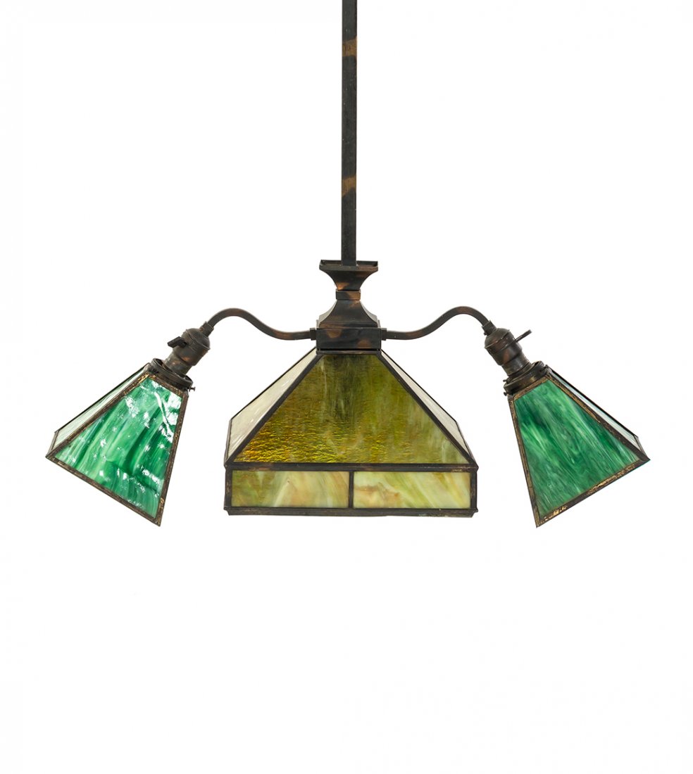 An Arts and Crafts Style Slag Glass Light Fixture,: An Arts and Crafts Style Slag Glass Light Fixture, having a square central shade issuing two arms terminating in green conical diffusers. Height 39 1/2 x width 20 inches.
