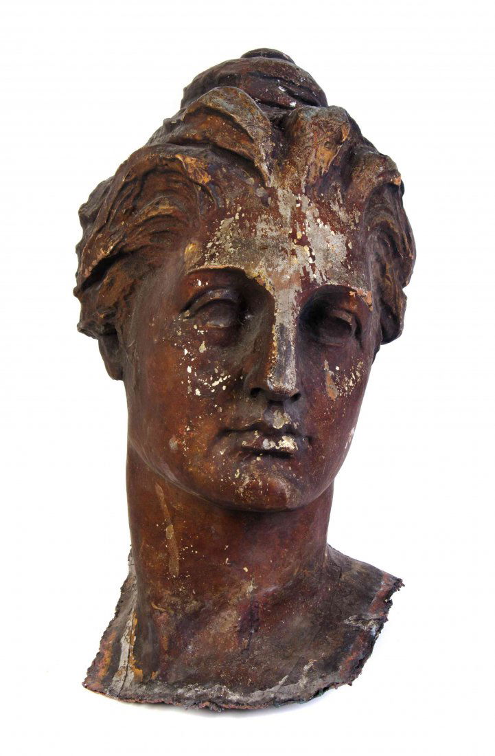 A Cast Metal Weathervane Remnant, designed by John: A Cast Metal Weathervane Remnant, designed by John Massey Rhind, from the Montgomery Ward Building, 1900, Chicago, Illinois, titled Progress Lighting the Way for Commerce, depicting the head of Progre