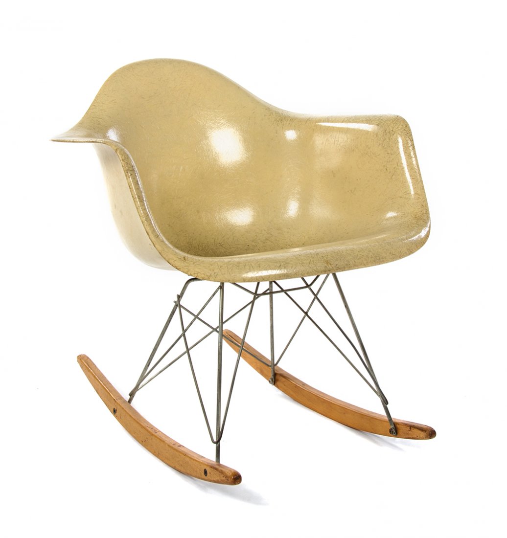 A Charles and Ray Eames Fiberglass RAR Rocker, Height: A Charles and Ray Eames Fiberglass RAR Rocker, the molded shell over an enameled zinc base, raised on twin supports. Height 27 inches. Property from the Estate of Jean Friedlander, Milwaukee, Wisconsi