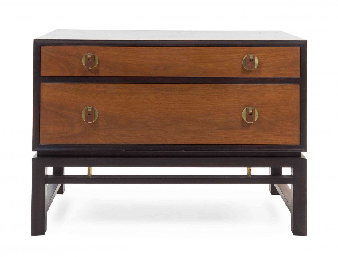 An Edward Wormley Walnut Chest of Drawers, for Dunbar,: An Edward Wormley Walnut Chest of Drawers, for Dunbar, having a rectangular top over two graduated drawers with brass handles, raised on square legs joined by stretchers. Height 23 1/2 x width 33 x de