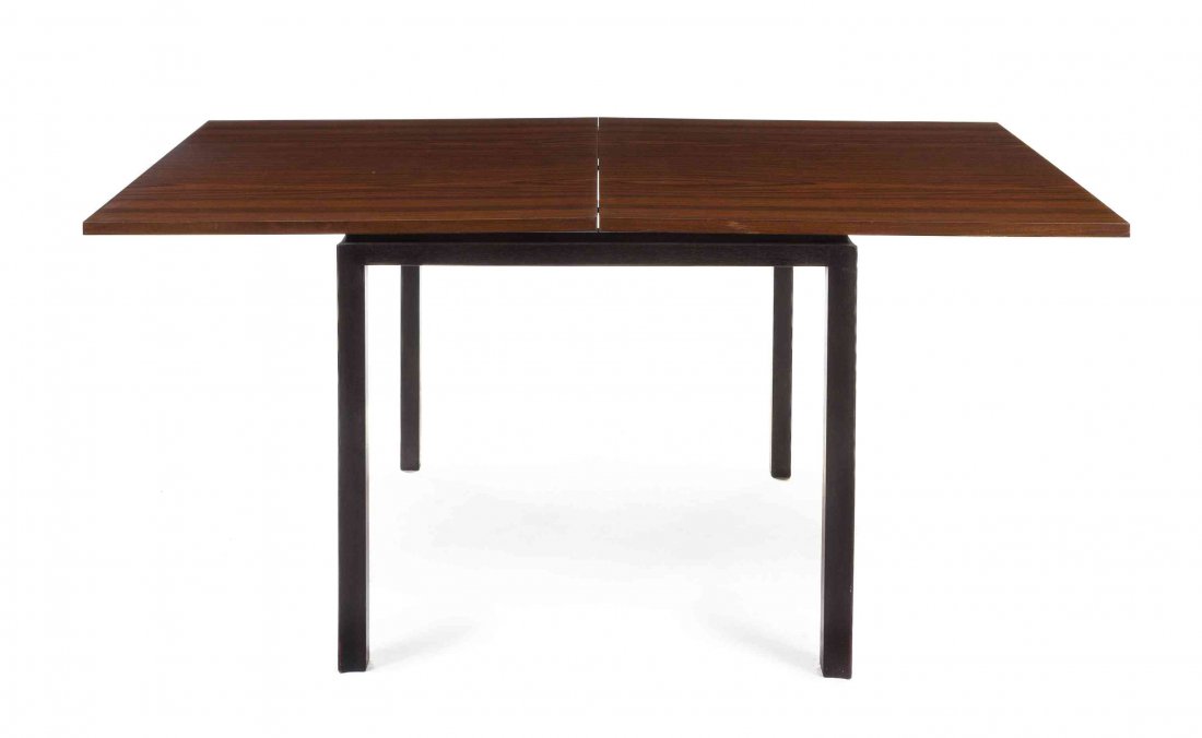 An Edward Wormley Walnut Flip Top Table, Height 29 x: An Edward Wormley Walnut Flip Top Table, having a square top, opening to a rectangle, raised on square form legs. Height 29 x width 32 1/8 x depth 32 1/8 inches (closed).