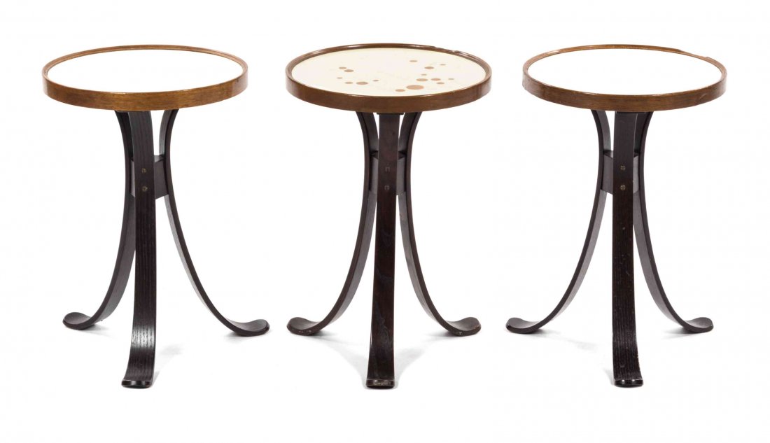 Three Edward Wormley Walnut and Laminate Side Tables,: Three Edward Wormley Walnut and Laminate Side Tables, for Dunbar, model 479A, each having a circular top, raised on three ebonized bentwood legs. Height 19 x diameter 13 inches. Property from the Esta