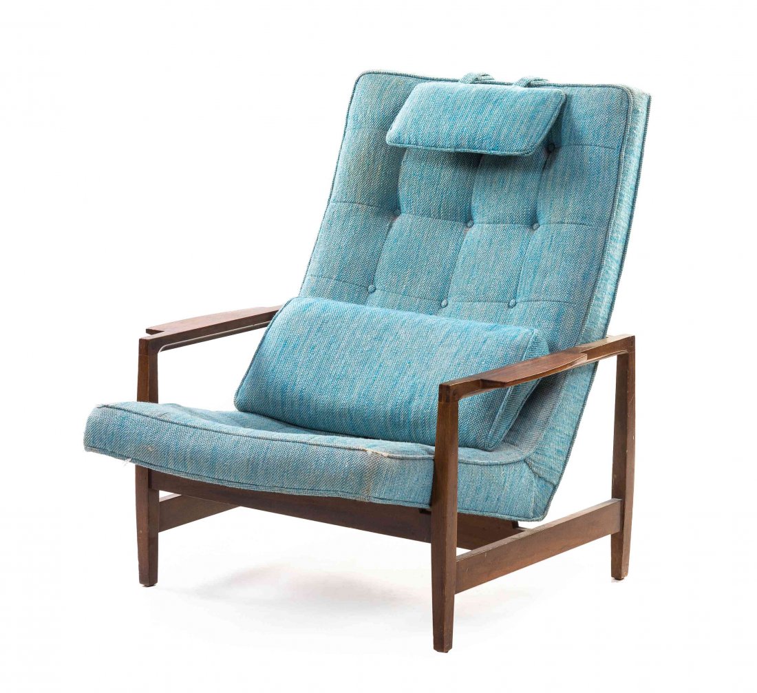 An Edward Wormley Walnut Lounge Chair, for Dunbar,: An Edward Wormley Walnut Lounge Chair, for Dunbar, having an upholstered back and seat within open arms. Height 37 inches. Property from the Collection of Dr. Howard and Gertrude Paule, Highland Park,