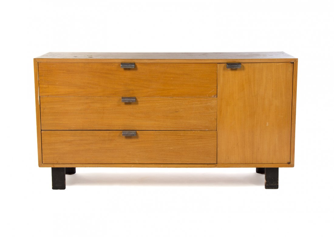 A George Nelson Oak Bedroom Suite, for Herman Miller,: A George Nelson Oak Bedroom Suite, for Herman Miller, comprising a dresser, a short chest, a long chest, a vanity and display case, each with chromed pulls, raised on ebonized feet. Length of longest 