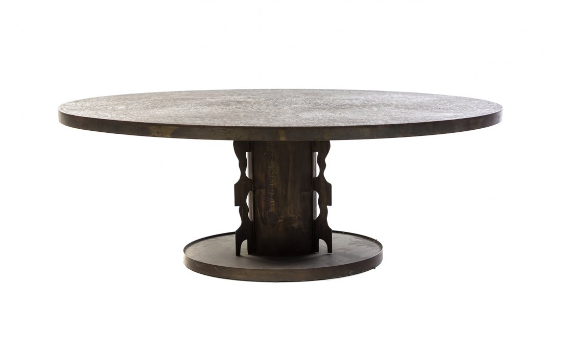 A Phillip and Kelvin Lavern Bronze Low Table, Height 17: A Phillip and Kelvin Lavern Bronze Low Table, in the Etruscan pattern, having a circular top with stylized decoration raised on a pedestal base. Height 17 x diameter 48 inches. The Estate of Seymour a