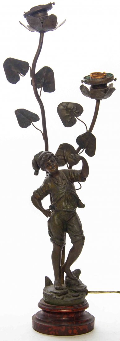 A Cast Metal Figural Newell Post Lamp, Height overall: A Cast Metal Figural Newell Post Lamp, cast as a boy in a hat, the two lighting elements modeled as flowers. Height overall 28 inches.