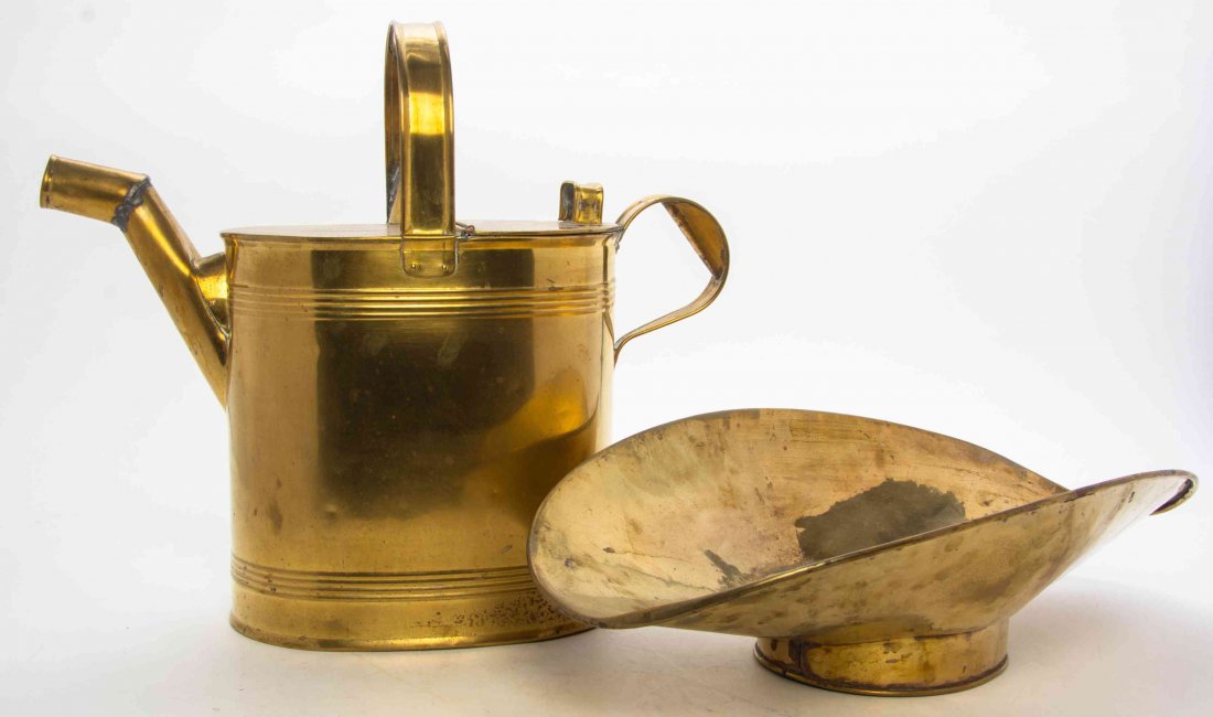 Two Brass Articles, Height of first 17 inches.: Two Brass Articles, comprising a watering can and a measure. Height of first 17 inches. Property from the Estate of Ruth K. Flower, Winnetka, Illinois Provenance: By family descent to the present owne