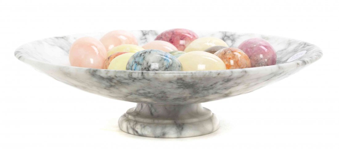 A Turned Alabaster Tazza, Diameter of first 15 3/4: A Turned Alabaster Tazza, of circular form, together with a collection of 15 stone eggs. Diameter of first 15 3/4 inches.