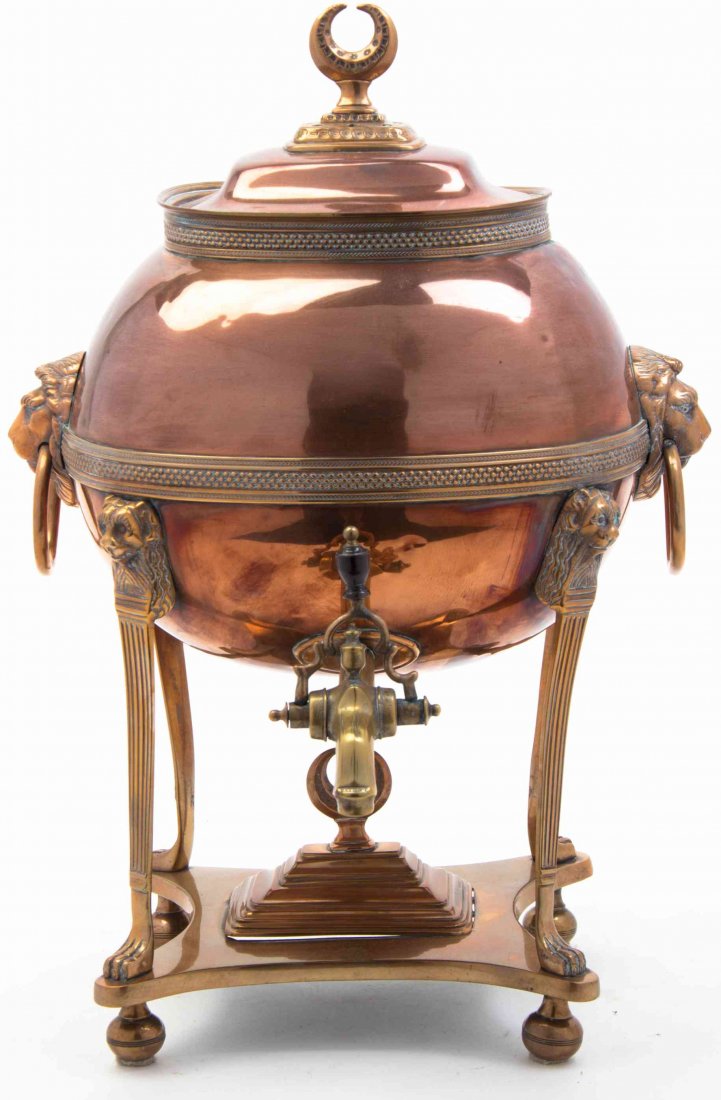 A Russian Copper Hot Water Kettle, Height 15 3/4: A Russian Copper Hot Water Kettle, having lion mask ring handles. Height 15 3/4 inches. Property from the Estate of Elizabeth Cheval, Lake Forest, Illinois