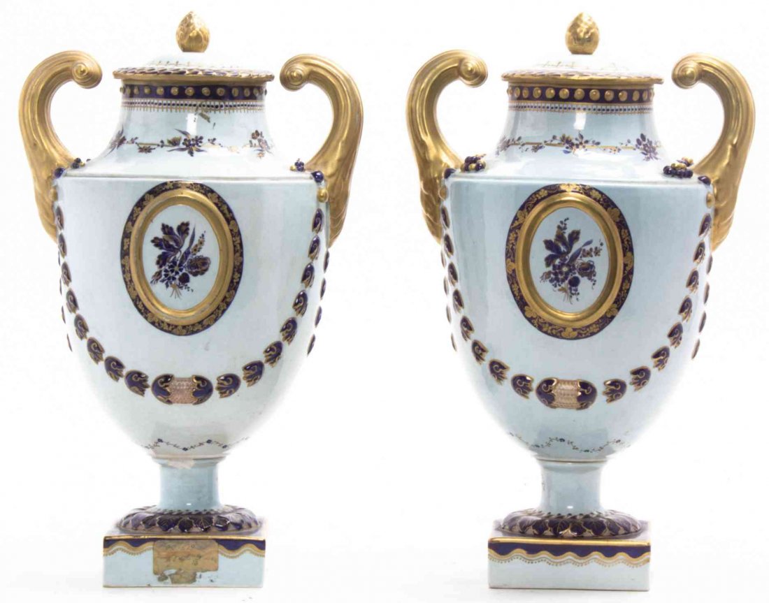 A Pair of Mottahedeh Porcelain Urns, Height overall 13: A Pair of Mottahedeh Porcelain Urns, each of handled baluster form. Height overall 13 1/2 inches. Property from the Estate of Dr. John P. & Shirley U. Waitkus, Chicago, Illinois