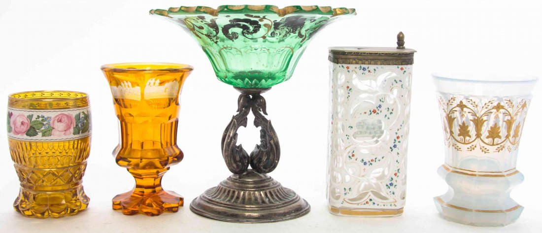 A Collection of Five Bohemian Glass Articles, Height of: A Collection of Five Bohemian Glass Articles, comprising a gilt decorated compote with silver foot, three beakers and a cased glass rectangular vase. Height of first 6 3/4 inches. Property from the Es