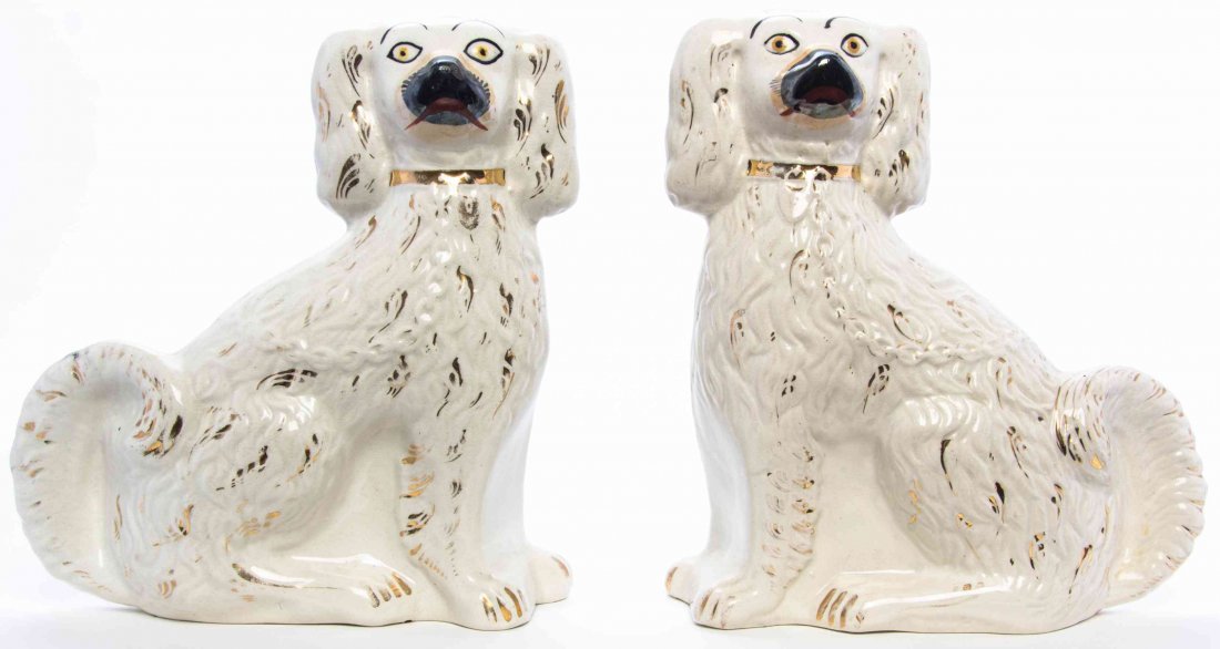 A Pair of Staffordshire Earthenware Dogs, Height 9 1/2: A Pair of Staffordshire Earthenware Dogs, each of spaniel form with a black snout. Height 9 1/2 inches.