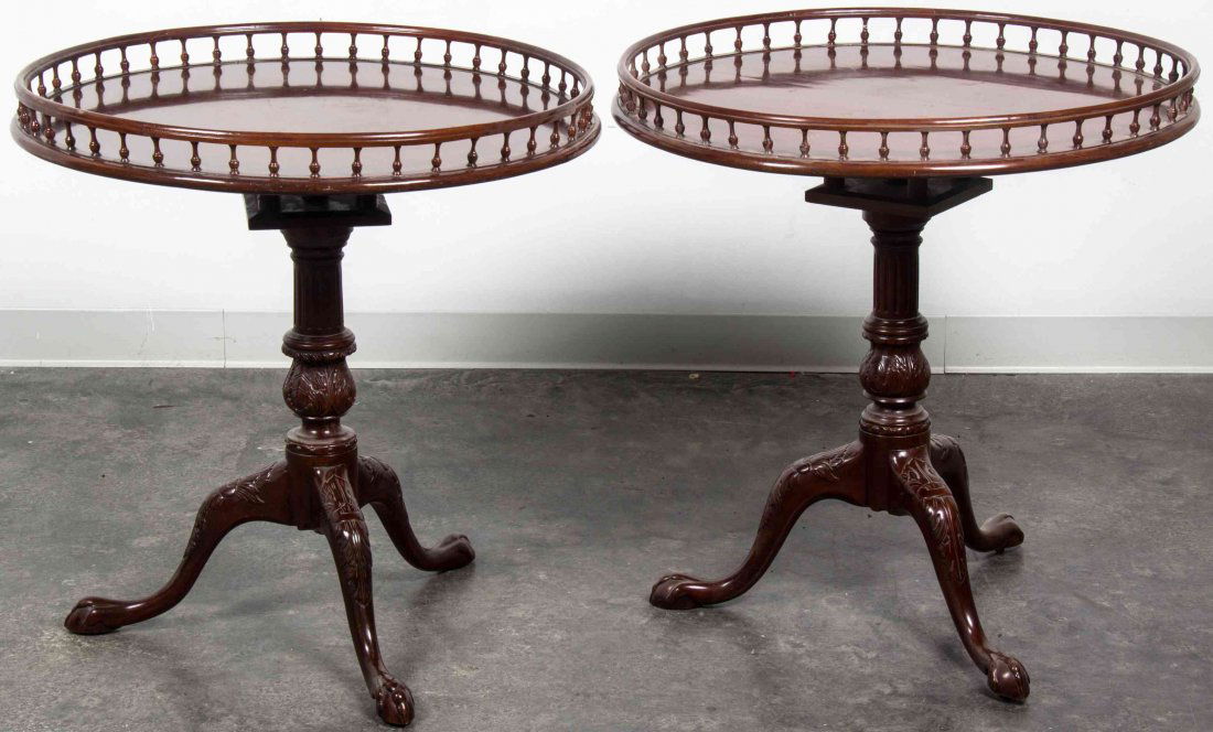 A Pair of George III Style Mahogany Tilt-Top Tea: A Pair of George III Style Mahogany Tilt-Top Tea Tables, each having circular galleried top above the birdcage support raised on a tripod base ending in claw and ball feet. Height 29 3/4 x diameter 29