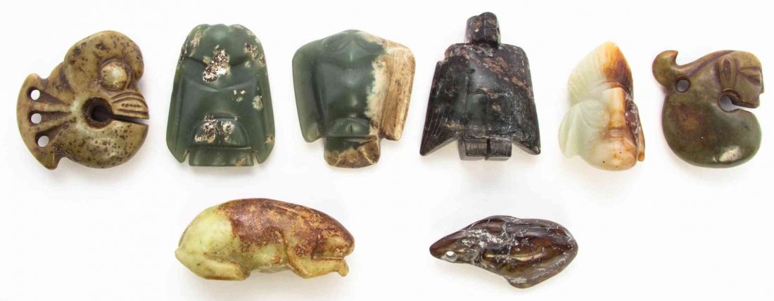 Eight Carved Hardstone Toggles, Length of longest 2 5/8: Eight Carved Hardstone Toggles, comprising three bird form examples, two Liangzhu style carvings and three other examples. Length of longest 2 5/8 inches. Property from the Estate of Alan D. Katz, Bou