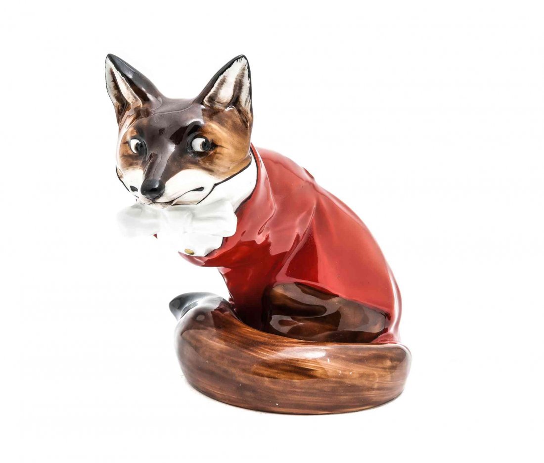 Royal Doulton Porcelain Figure of a Fox in Red Coat,: Royal Doulton Porcelain Figure of a Fox in Red Coat, depicted seated, stamped to underside. Height 6 1/4 inches.
