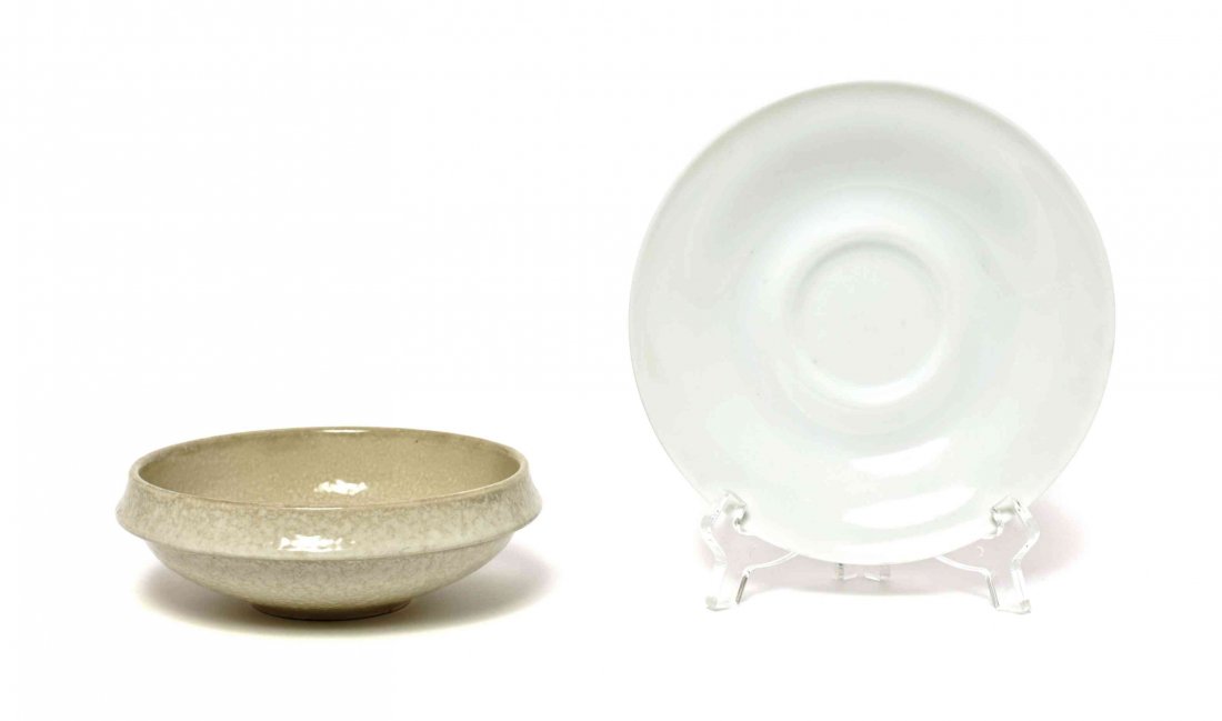 Two Russel Wright Prototype Ceramic Articles, Diameter: Two Russel Wright Prototype Ceramic Articles, circa 1964, from the Theme Formal and Theme Informal patterns, by Yamato Porcelain Company of Tajimi, Japan, comprising a white glazed porcelain saucer, a
