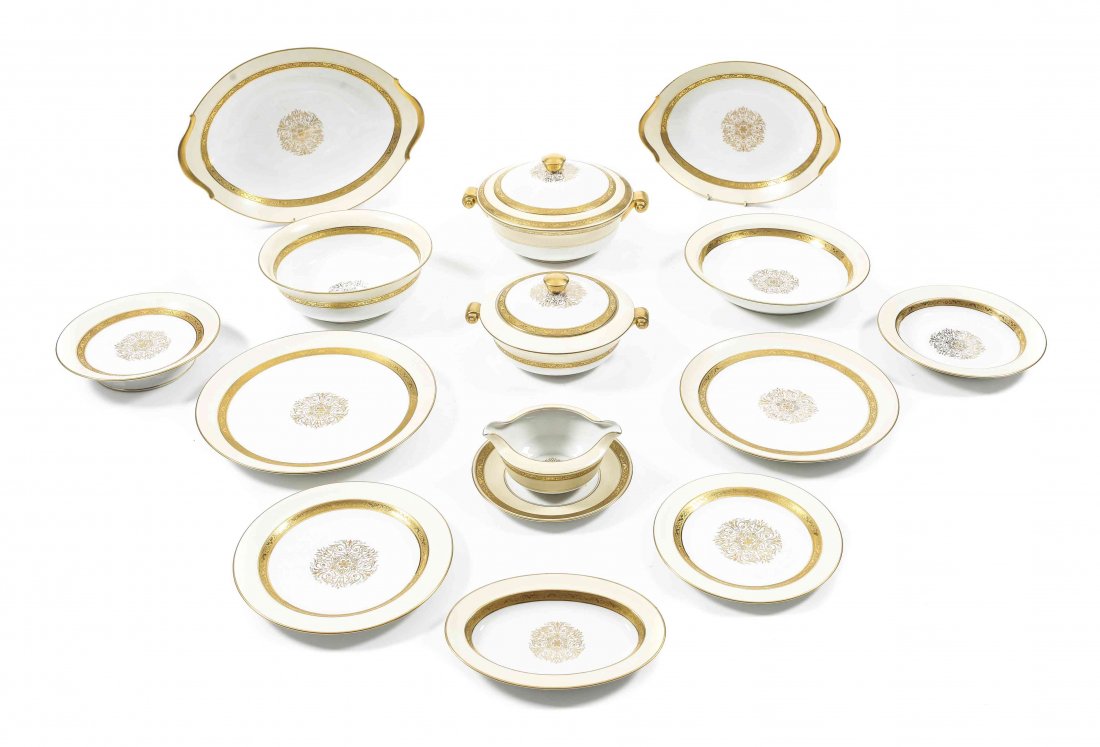 A Large Porcelain Dinner Service, Limoges, Length of: A Large Porcelain Dinner Service, Limoges, 20th century, comprising 36 dinner plates, 11 salad plates, 12 soup plates, 2 compotes, 2 round serving platters, 2 oval serving platters,2 small oval dishes