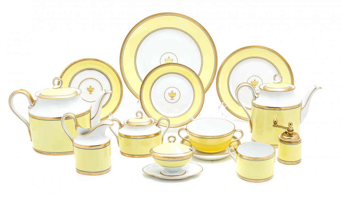 A Partial Porcelain Dinner Service, Richard Ginori,: A Partial Porcelain Dinner Service, Richard Ginori, 20th century, in the Impero Yellow pattern comprising 12 dinner plates, 12 salad plates, 12 side plates, 12 side bowls, 12 coffee cups and saucers, 