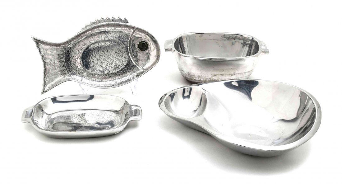 A Collection of Twelve Aluminium Serving Pieces, Length: A Collection of Twelve Aluminium Serving Pieces, including a five-piece Bruce Fox Design lobster service, three fish-shaped platters, a large oval serving platter, two oval dishes, and a Nambe chip an