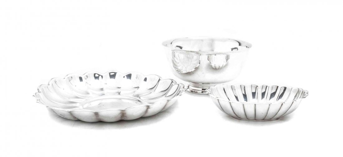 A Collection of Three American Silver-Plate Table: A Collection of Three American Silver-Plate Table Articles, REED & BARTON, TAUNTON, MA., 20TH CENTURY, comprising two dishes in the Holiday pattern and one center bowl. Diameter of largest 13 1/8 inch