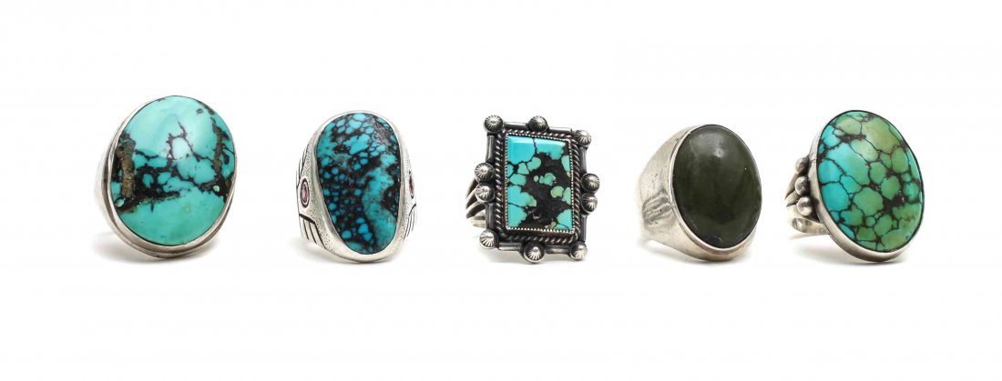 Four Southwestern Silver and Turquoise Rings,: Four Southwestern Silver and Turquoise Rings, together with a ring having a green stone cabochon. Property from the Estate of Alan D. Katz, Boulder, Colorado