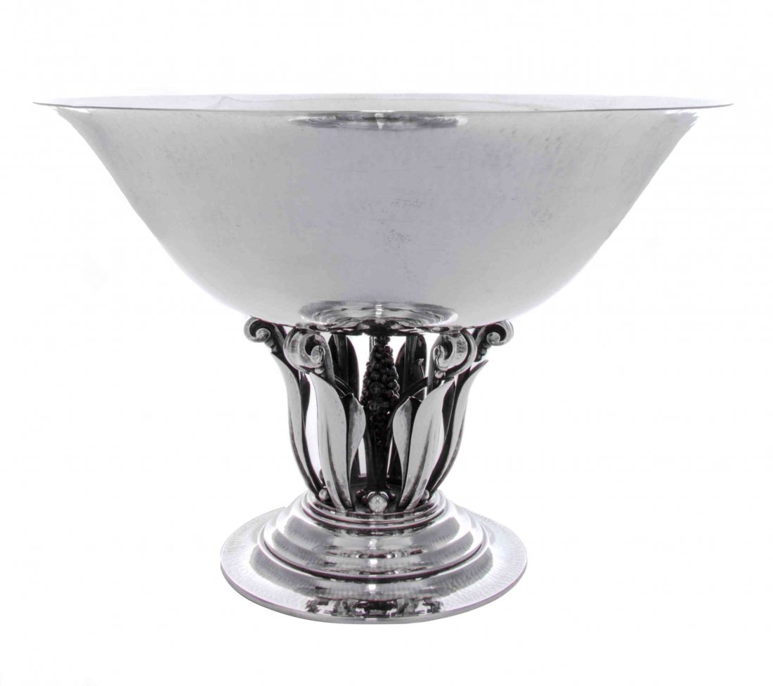 A Danish Silver Bowl, No. 196, Georg Jensen: A Danish Silver Bowl, No. 196 Georg Jensen Silversmithy, Copenhagen, 1925-32 designed by Johan Rohde in 1916, with lightly spot-hammered surface, the circular bowl with flaring rim, supported on an op