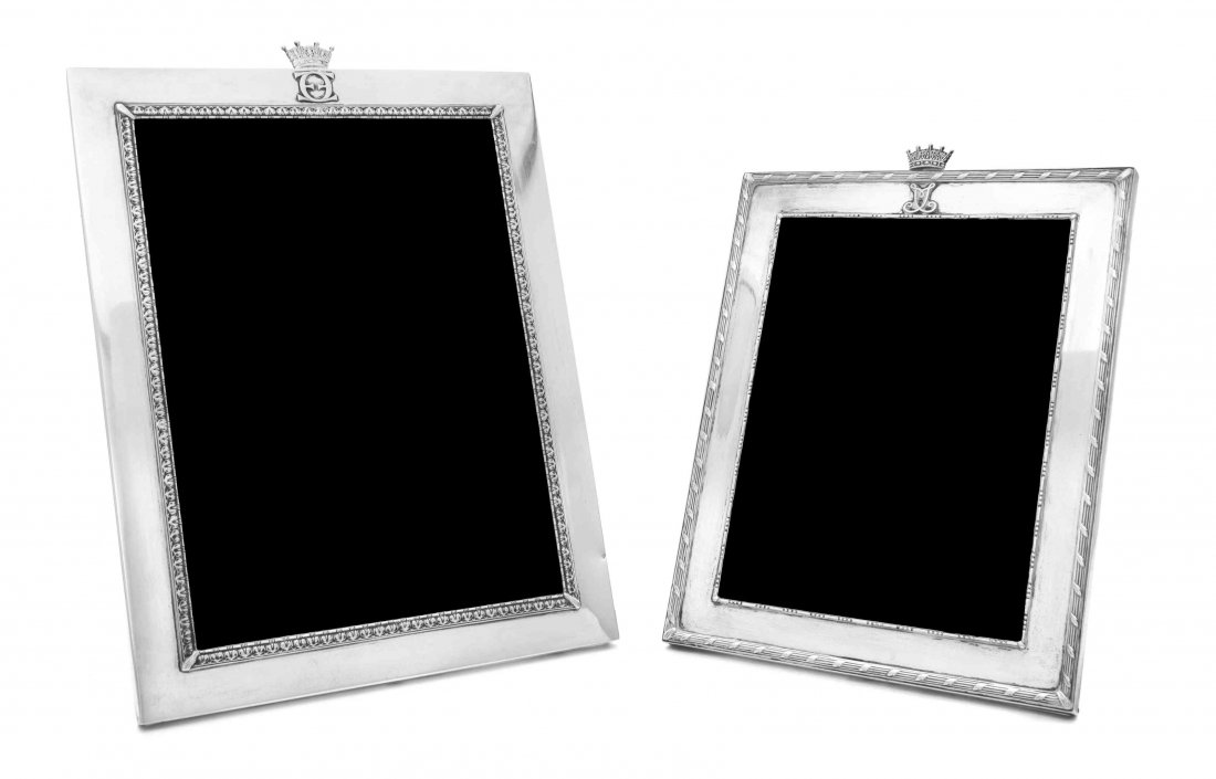 Two Swedish Silver Photo Frames, W.A. Bolin, Stockholm,: Two Swedish Silver Photo Frames W.A. Bolin, Stockholm, 1933 both rectangular with wood easel backs, the larger with leaf-tip rims, the border applied with reverse cypher E and topped with a coronet, t