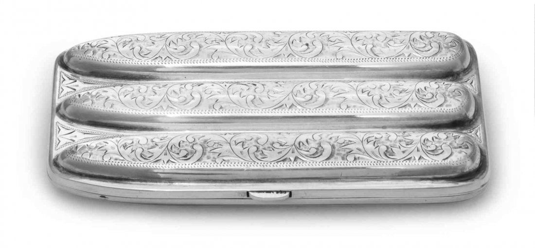 A Silver Cigar Case, Possibly American, Late 19th: A Silver Cigar Case Possibly American, Late 19th Century shaped rectangular and fitted for three cigars, the hinged covers bright-cut and engraved with panels of scrolling acanthus within wrigglework