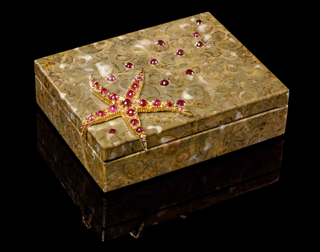 An Italian Silver-Gilt and Ruby-Mounted Marble Box,: An Italian Silver-Gilt and Ruby-Mounted Marble Box Nardi, Venice, 20th Century the rectangular marble body with hinged cover inset with twelve rubies and mounted in one corner with a draped silver-gil