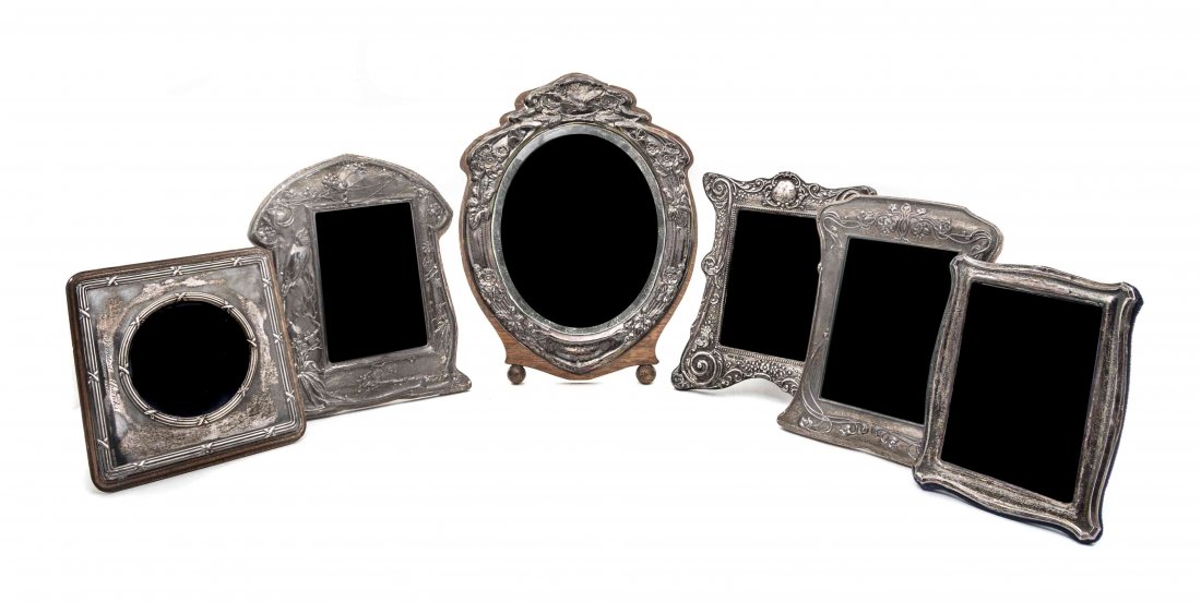 A Group of Six Edwardian and George V Silver Frames,: A Group of Six Edwardian and George V Silver Frames Various Makers, Birmingham, 1903-16 all with easel backs, comprising a shaped rectangular example chased with scrolls and flowers, Matthew John Jess