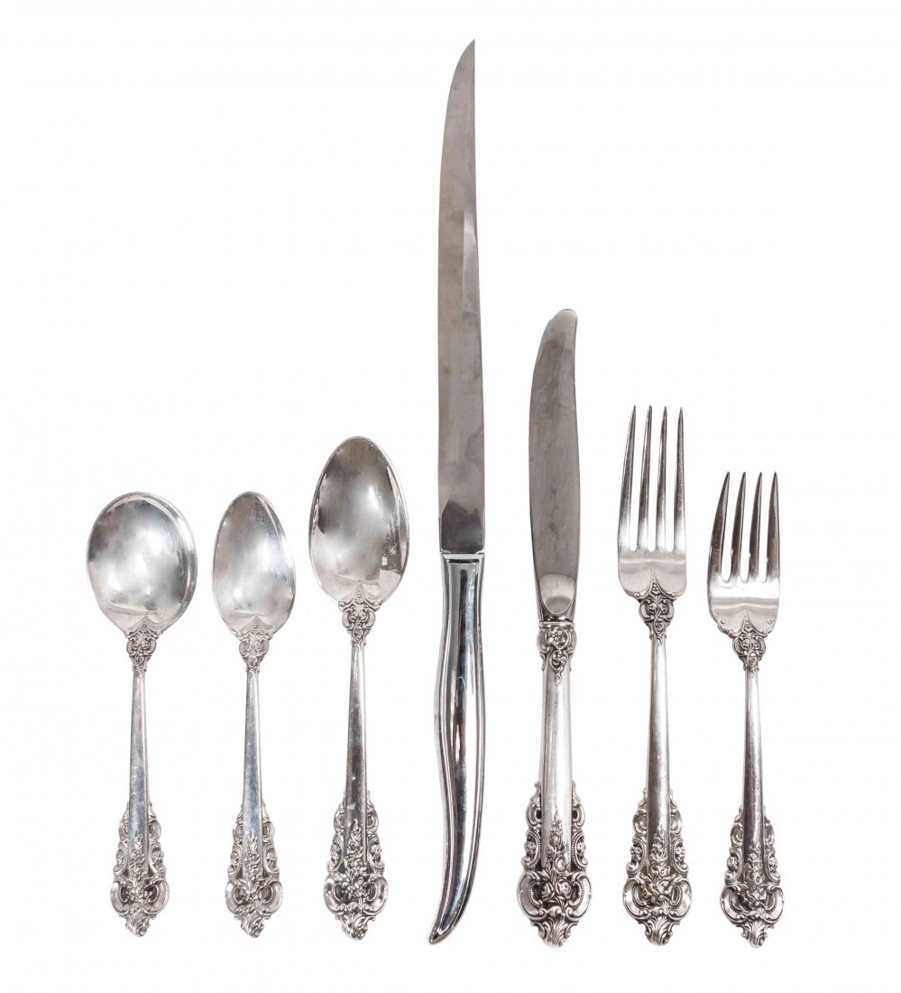 An American Silver Flatware Service, Wallace Silversmit: An American Silver Flatware Service, Wallace Silversmiths, Grand Baroque pattern, comprising 12 dinner knives 12 dinnner forks 12 luncheon forks 22 teaspoons 8 tablespoons 4 boullion spoons 4 iced tea
