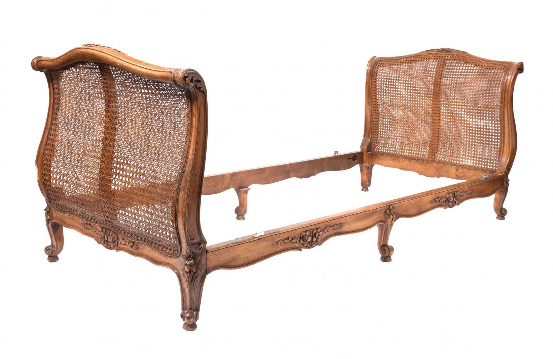 A Louis XV Style Walnut Recamier, Width 87 inches.: A Louis XV Style Walnut Recamier, with caned sides. Width 87 inches. Property from the Estate of Dr. Fred A. Goldberg, Memphis, Tennessee