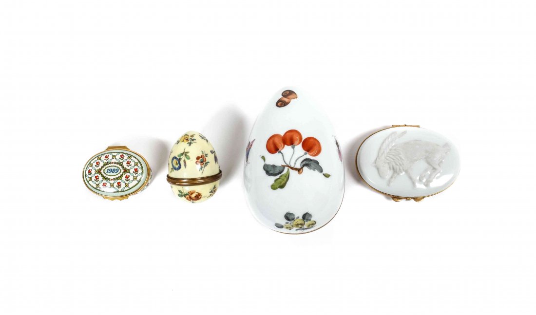 A Collection of Four Decorative Boxes, Height of first: A Collection of Four Decorative Boxes, comprising a Herend porcelain box painted with fruit and butterflies, two English enameled boxes, and a porcelain box decorated with a ram. Height of first 2 7/8