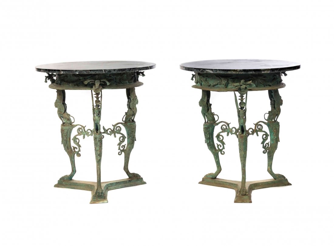 A Pair of Neoclassical Style Patinated Metal Gueridons,: A Pair of Neoclassical Style Patinated Metal Gueridons, each having a circular marble top over a festoon decorated frieze, raised on three supports headed by sphinxes and ending in monoped feet joined