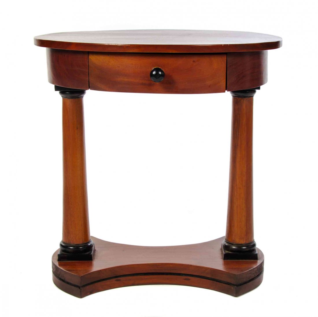 A Biedermeier Style Occasional Table, Height 26 1/2 x: A Biedermeier Style Occasional Table, having an oval top above a plain frieze set with a single drawer, raised on columnar supports joined by a medial shelf. Height 26 1/2 x width 25 x depth 21 inches