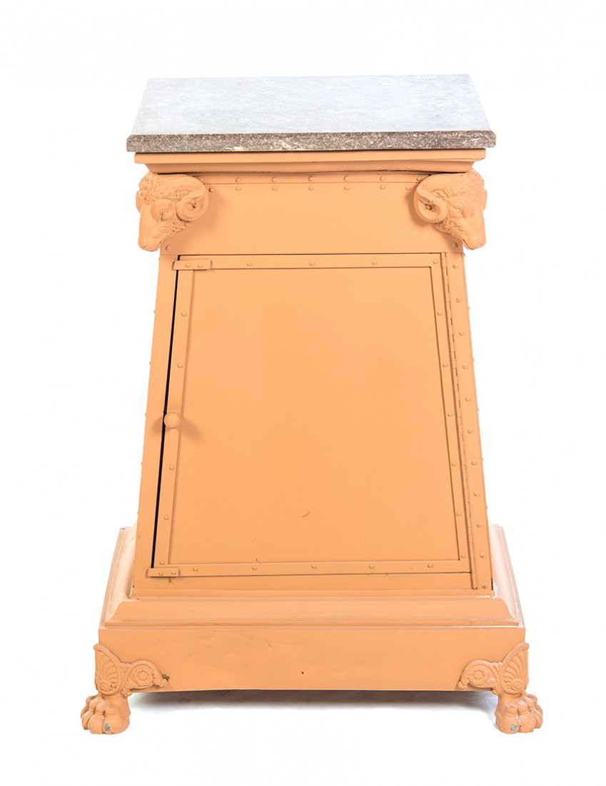 An Empire Style Tole Console Cabinet, Height 36 x width: An Empire Style Tole Console Cabinet, having an associated rectangular top set on a trapezoidal case, decorated with ram masks, roundels and raised on paw feet. Height 36 x width 28 x depth 18 inches.