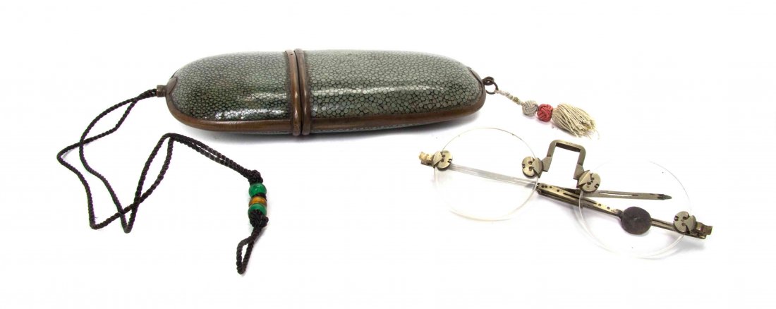 A Shagreen Eyeglass Case, Length 7 1/2 inches.: A Shagreen Eyeglass Case, of oval form, together with a pair of vintage eyeglasses. Length 7 1/2 inches.