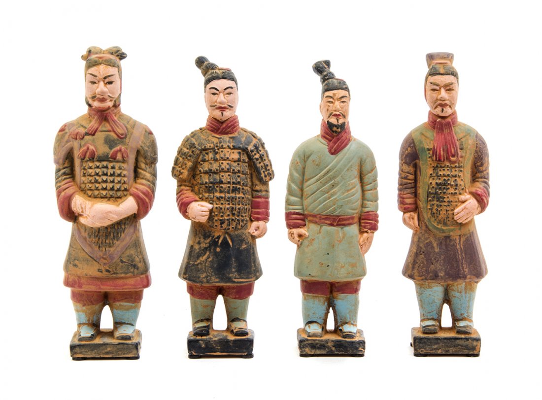 Four Chinese Pottery Figures of Terracotta Warriors,: Four Chinese Pottery Figures of Terracotta Warriors, three depicted with armor, each with polychrome decoration and raised on a square base. Height of tallest 9 inches.