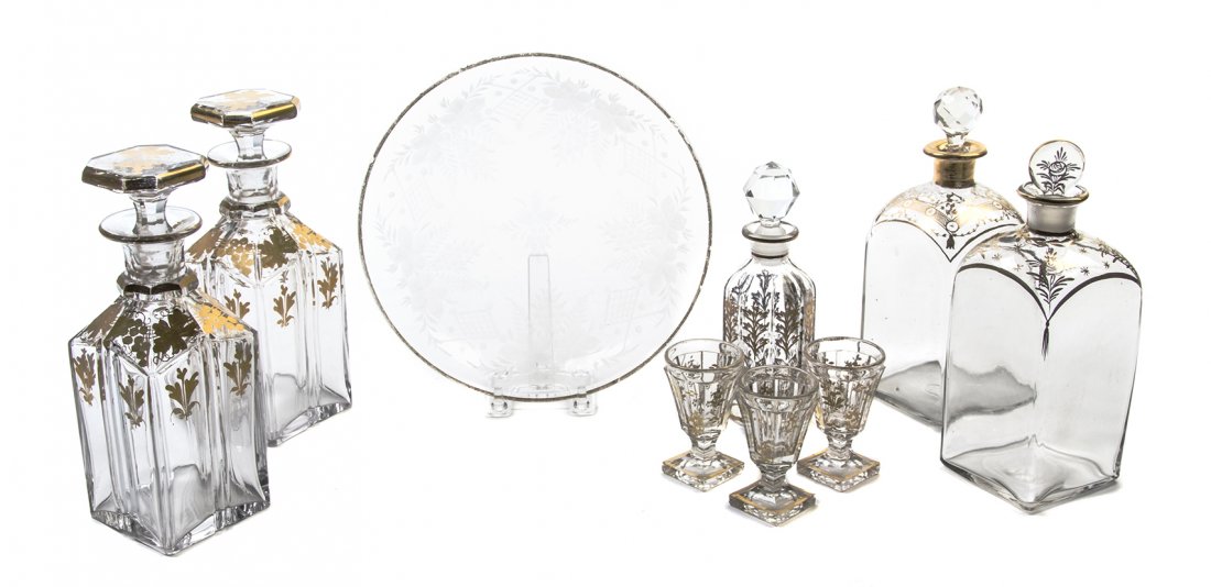 A Collection of Continental Gilt Decorated Glass: A Collection of Continental Gilt Decorated Glass Articles, comprising five decanters, three cordials and a dish. Height of tallest 7 3/4 inches.