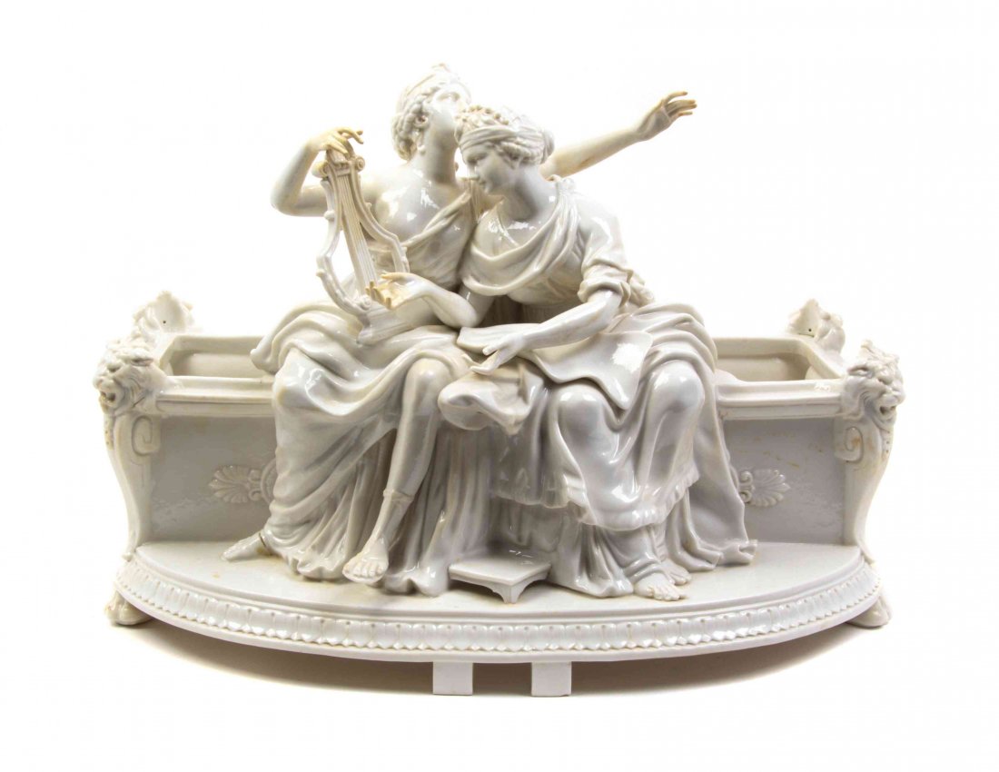 A Capodimonte Porcelain Figural Jardiniere, Width 13: A Capodimonte Porcelain Figural Jardiniere, modeled as a courting couple. Width 13 1/2 inches.