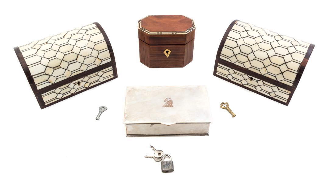 A Collection of Table Caskets, Width of widest 6 1/8: A Collection of Table Caskets, including silver-plate, mahogany and bone veneered examples. Width of widest 6 1/8 inches.