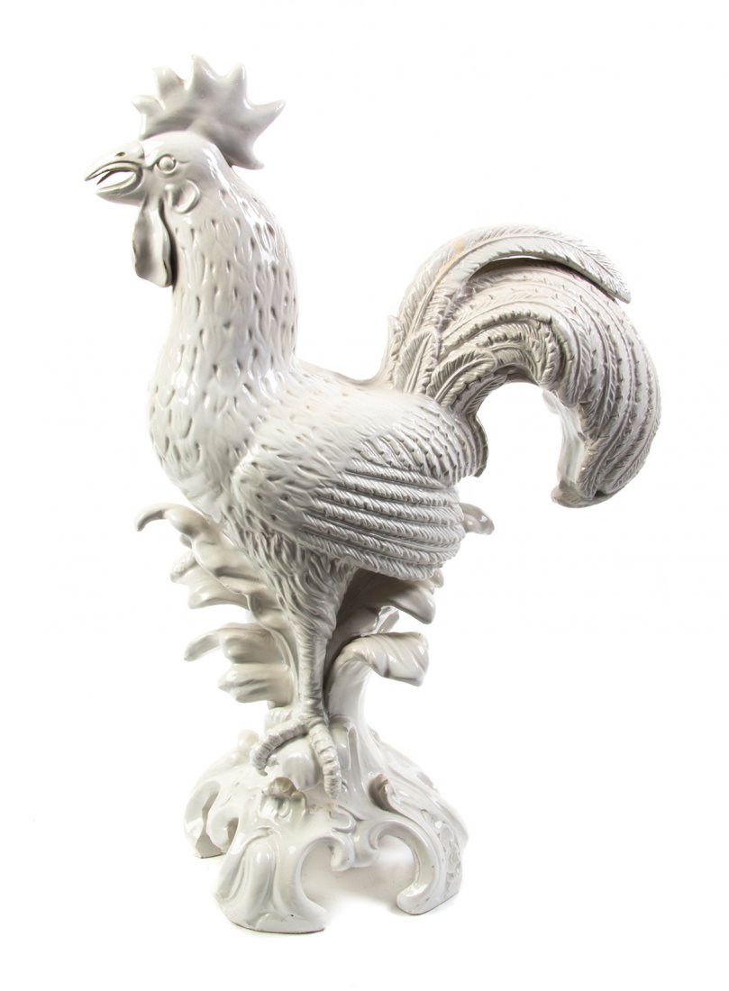 A Collection of Decorative Table Articles, Height of: A Collection of Decorative Table Articles, comprising a ceramic rooster, a bank, an ostrich egg, an alligator and three others. Height of tallest 20 3/4 inches.