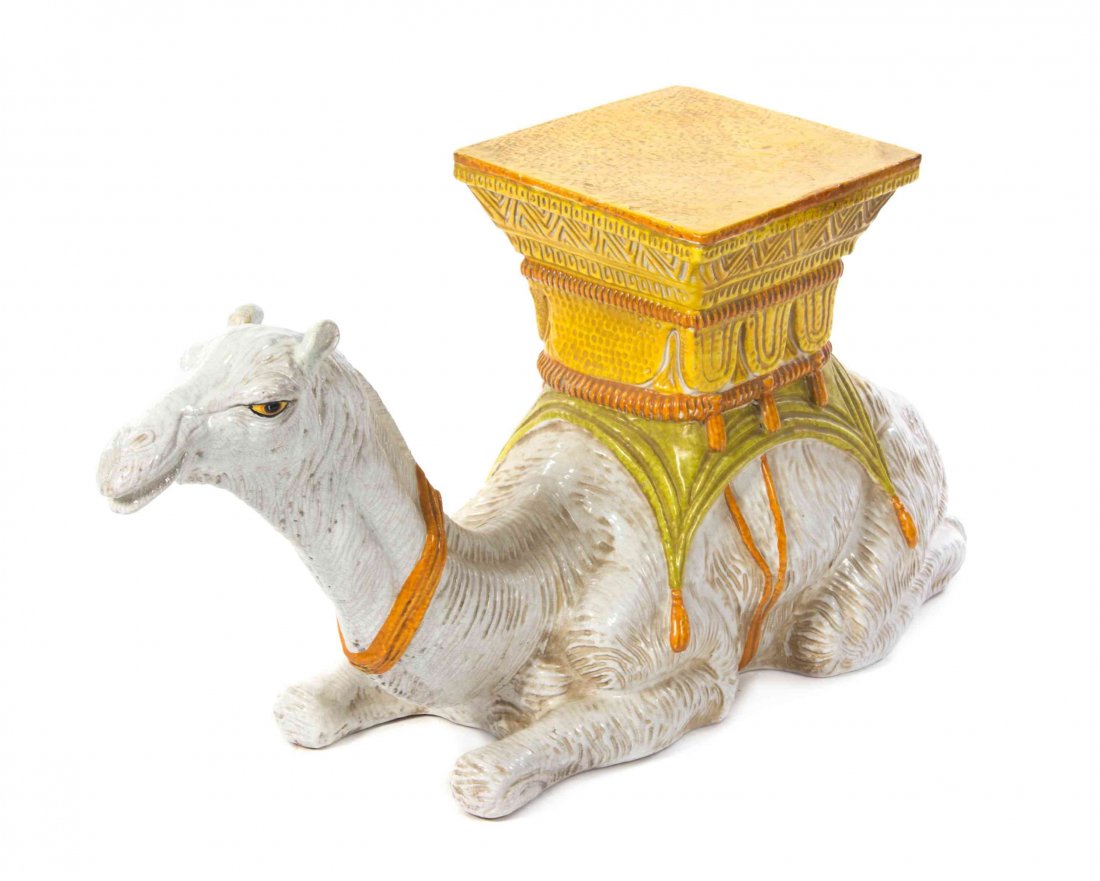 An Italian Ceramic Stool, Height 19 inches.: An Italian Ceramic Stool, modeled as a recumbent camel with a seat on its back. Height 19 inches.